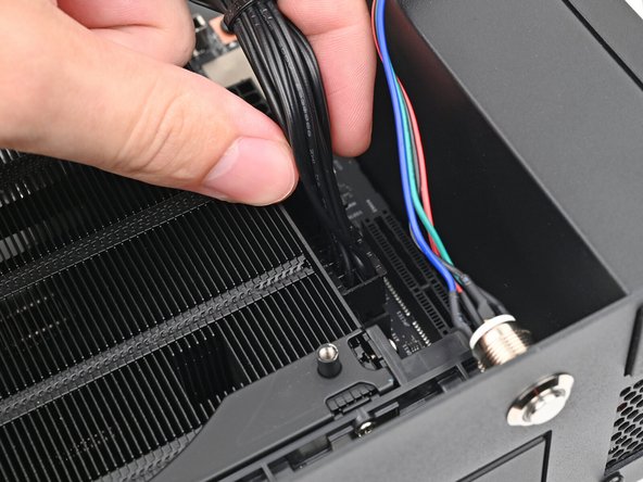 Slide the cable into its socket on the Mainboard until you feel it click into place.