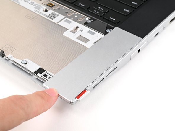 Repeat the previous step for the other Touchpad Spacer.