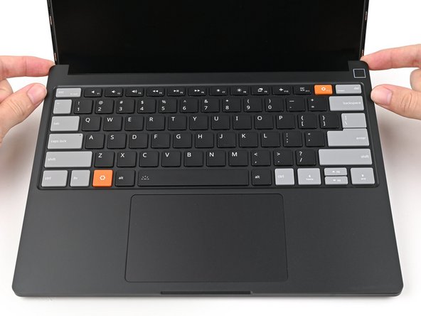 Lay the Input Cover over the Laptop and let the magnets snap it into place.