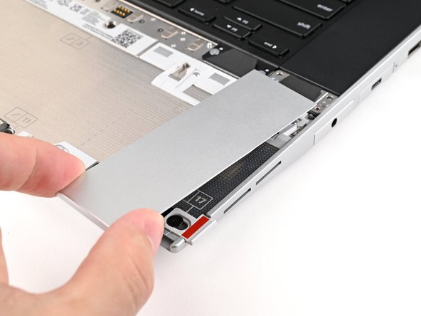 Repeat the previous step for the other Touchpad Spacer.