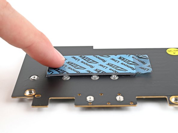 Use your finger to gently press the thermal pad onto the adapter.