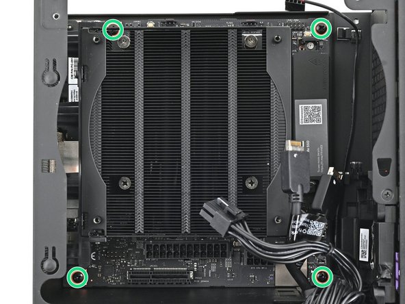 Use your Framework Desktop Screwdriver to install the four 8.2 mm‑long Phillips screws securing the Mainboard.