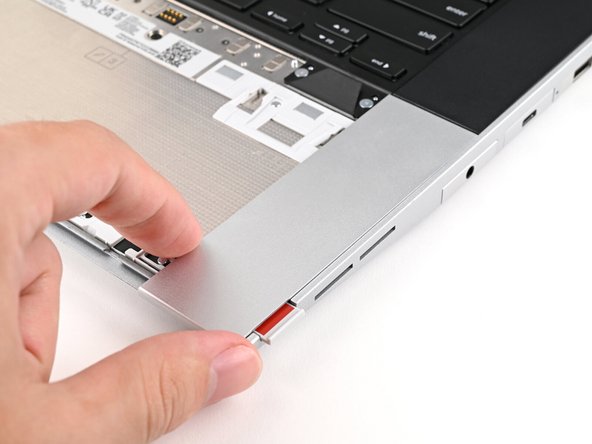 Repeat the previous step for the other Touchpad Spacer.