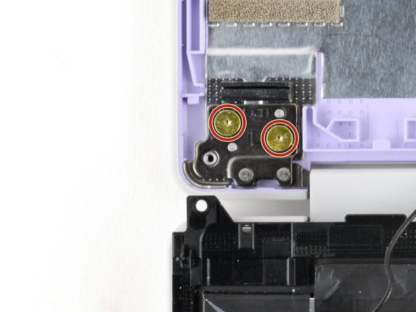 Use your Framework Screwdriver to install the four 2.4 mm‑long T5 Torx screws to secure the two hinges to the Top Cover.