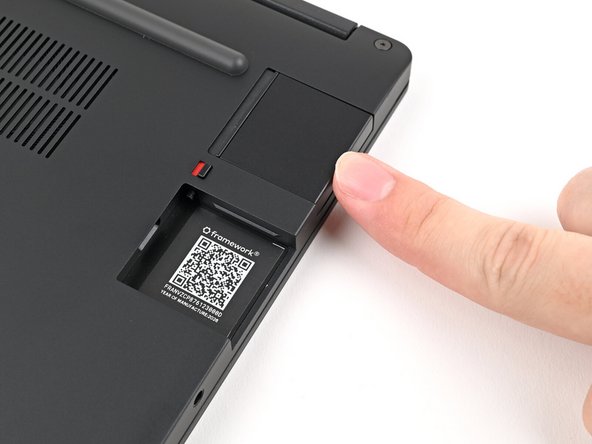 Slide an Expansion Card into an Expansion Card slot.
