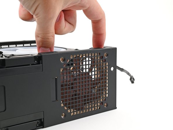 If your fan has an arrow indicating airflow direction, make sure it's pointed towards the heatsink.