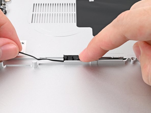 Repeat the previous two steps for the section of the speaker cable near the left Speaker.