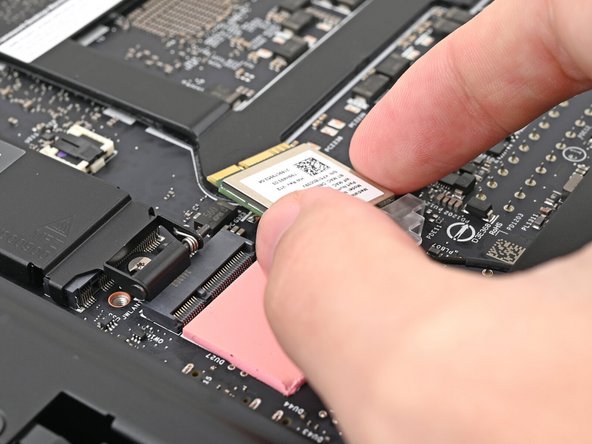 Move the Wi-Fi module towards the center of the Mainboard to keep it out of the way.