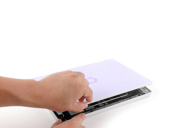 Swing the lid open until the screen's tilted back slightly.