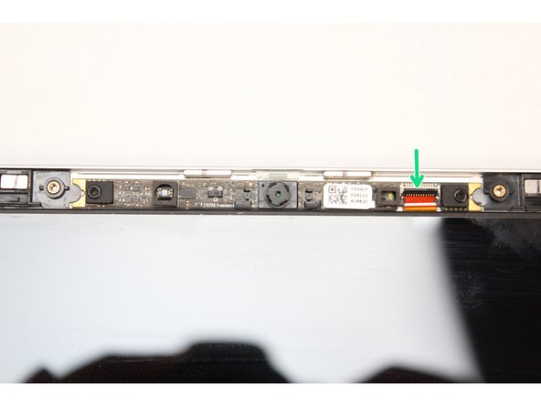 Flip the black latch down to secure the cable in place.