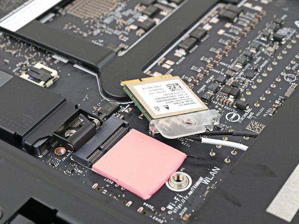 Move the Wi-Fi module towards the center of the Mainboard to keep it out of the way.