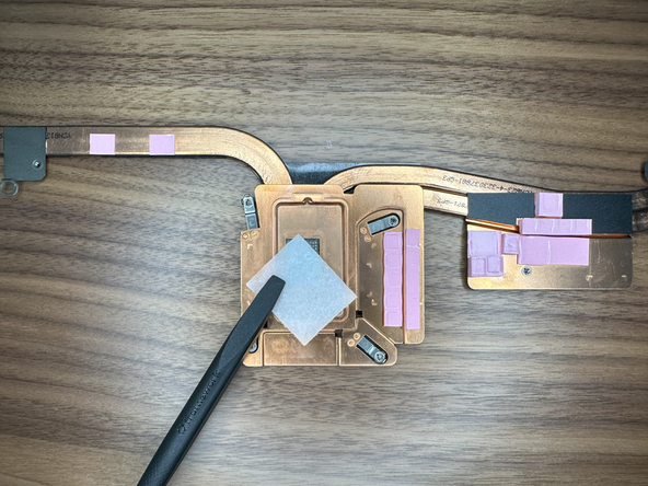 Using the Isopropyl Alcohol, clean off the sponge residue and wipe down the silver honeycomb textured plate.