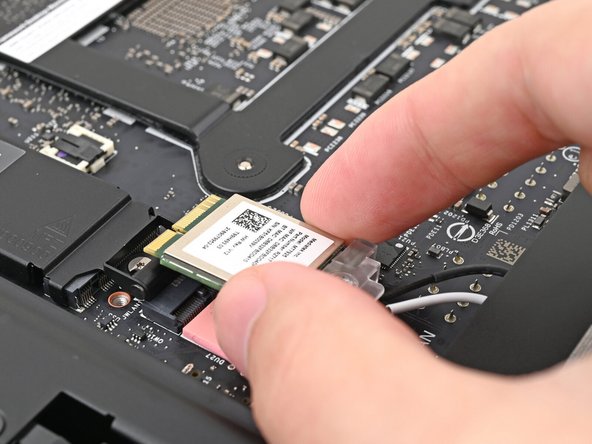 Move the Wi-Fi module towards the center of the Mainboard to keep it out of the way.