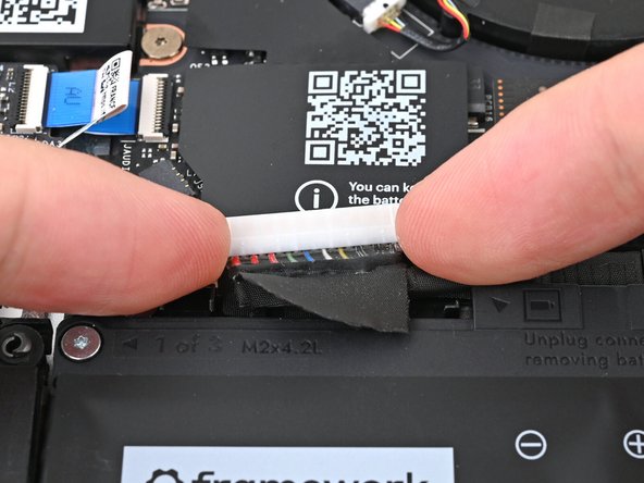 Use your fingers to align the Battery connector with its socket and slide it straight in to reconnect the Battery.