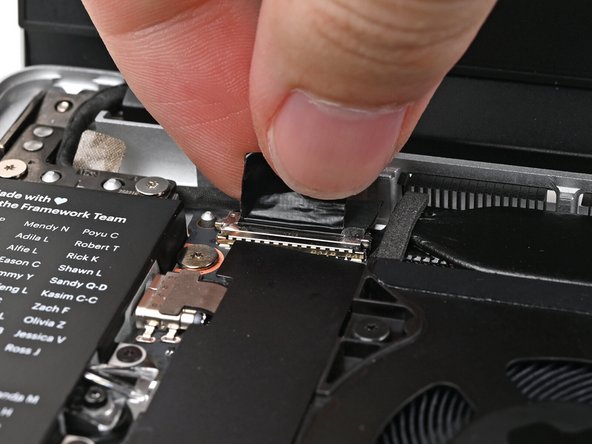 Press the Display eDP Cable connector straight down into its socket to connect it.