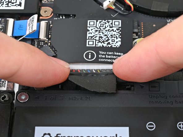 Use your fingers to align the Battery connector with its socket and slide it straight in to reconnect the Battery.