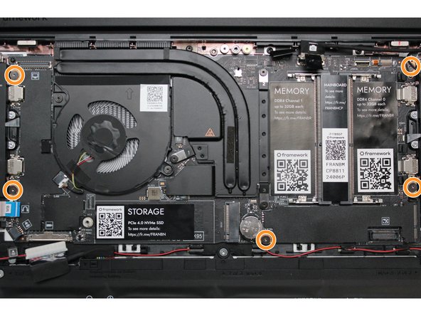 The alignment pins are located on the Bottom Cover as indicated with the green arrows in the second image.