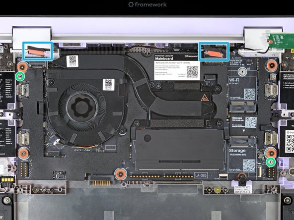 Use the two alignment pins to help align the Mainboard to the laptop.