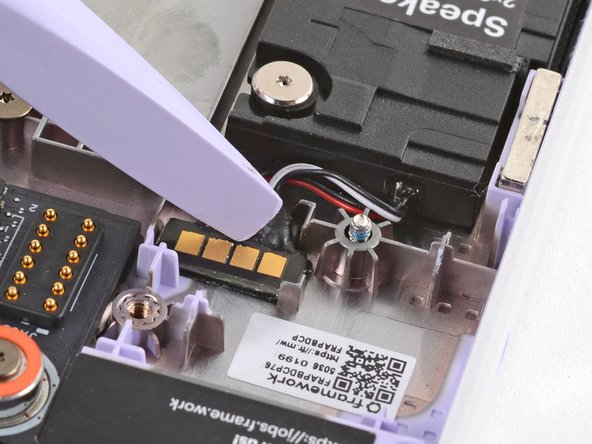 Make sure the gold contacts are facing up.