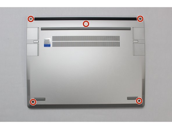 Close the Framework Laptop and place it upside down to reveal the fasteners on the Bottom Cover.