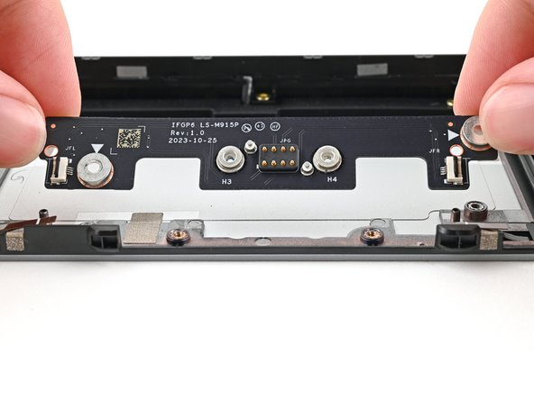 Use your fingers to lift the board straight off its alignment pegs on Expansion Bay Shell and remove it.