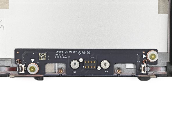 Use your Framework Screwdriver to remove the two 3.6 mm‑long screws securing the Expansion Bay Shell Fan Board.