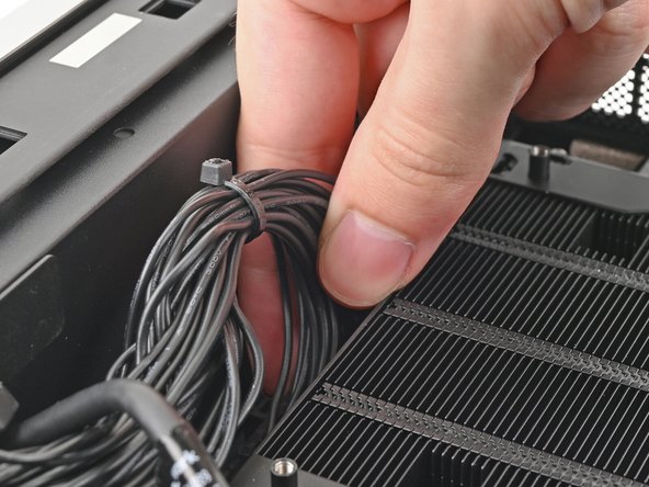 Slide the cable into its socket on the Mainboard until you feel it click into place.