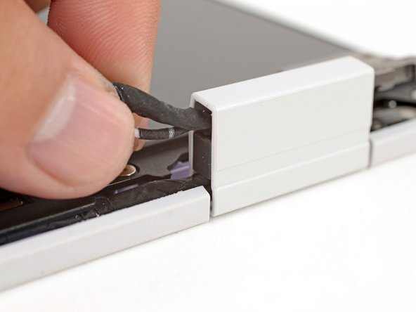 Repeat the procedure on the right hinge to release the cables.