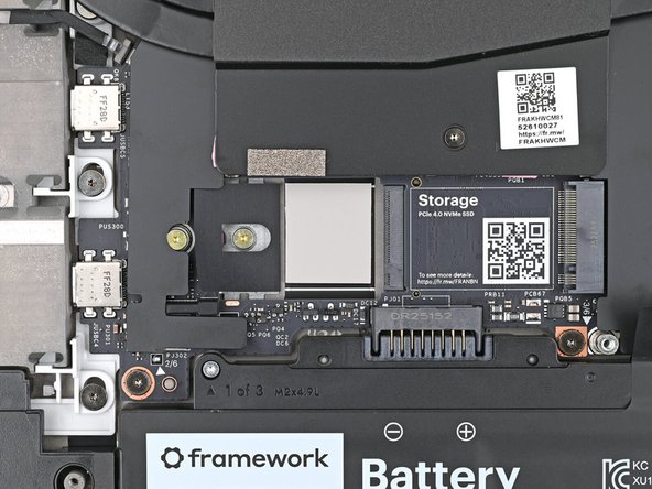 Use your Framework Screwdriver to remove the 2 mm‑long T5 Torx screw securing the secondary SSD.