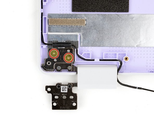 Use your Framework Screwdriver to remove the four (two per hinge) 2.5 mm‑long T5 Torx screws securing the two hinges to the Top Cover.
