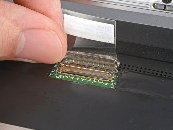 Slide the eDP cable connector straight into its socket.