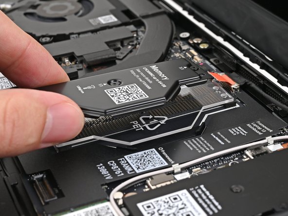 Lift the LPCAMM2 Memory Cover straight off the memory and remove it.