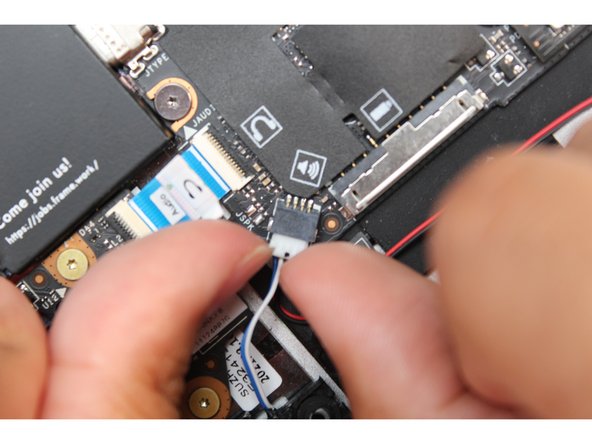 Using your fingers and a slight amount of force, insert the speaker connector straight into the Mainboard.