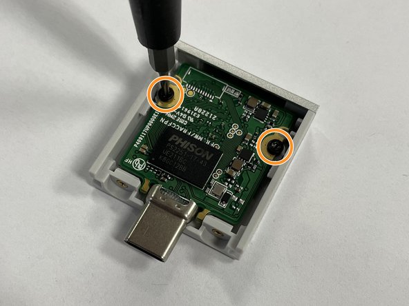 Put the PCB back into the enclosure and fasten in back into place using the T5 bit in the Framework Screwdriver.