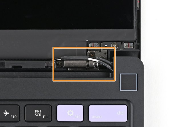 The Display Cable should be routed just above the hinge without any large gaps.