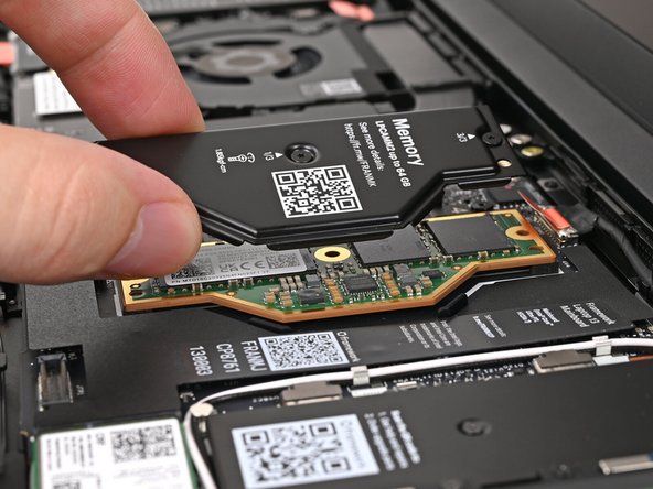 Lift the LPCAMM2 Memory Cover straight off the memory and remove it.