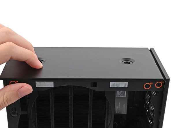 If you're having a hard time gripping the Top Panel, use the screw holes to get a better handhold.