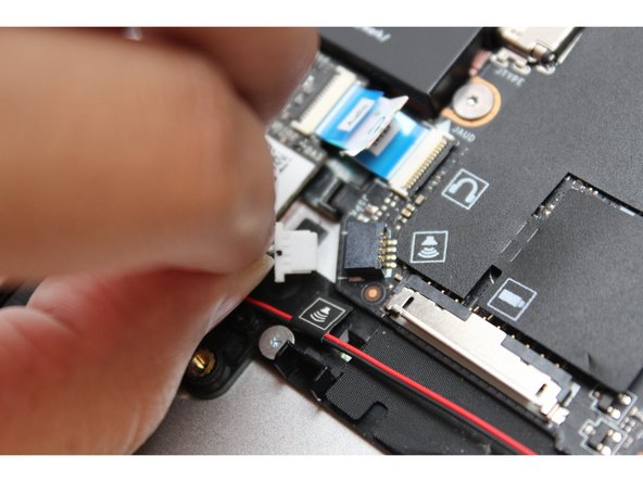 Using your fingers and a slight amount of force, insert the speaker connector straight into the Mainboard.