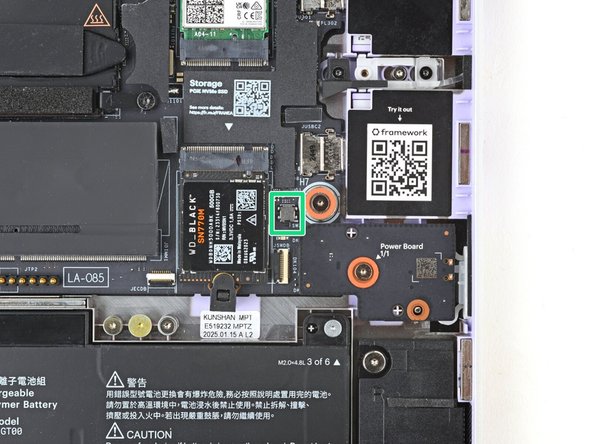 Locate the chassis open switch to the right of the SSD slot.