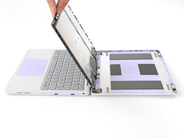 Use your fingers to carefully swing the display over so it lies on top of the Top Cover.