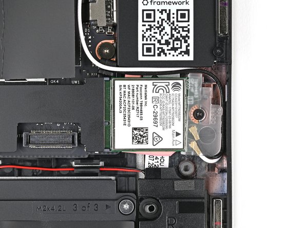 The module might pop up at a shallow angle when you loosen the screw.