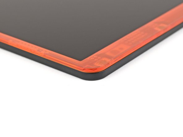 Use your fingers to press around the edge of the Bezel. The magnets should easily snap into place.