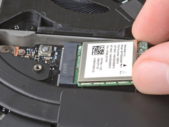 Grip the end of the Wi-Fi Module with the screw hole and slide it out of its socket.