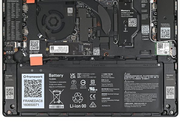 Use your Framework Screwdriver to loosen the three captive T5 Torx screws securing the Battery.