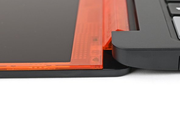 Check that all four corners of the Bezel sit flat on the screen. If they're uneven, do the following: