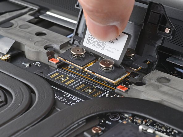 Place the interposer over its spot between the Mainboard and the module.