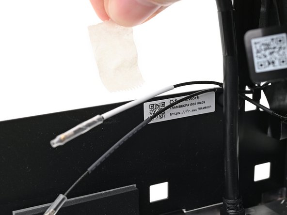 Peel off the tape covering the antenna cables.
