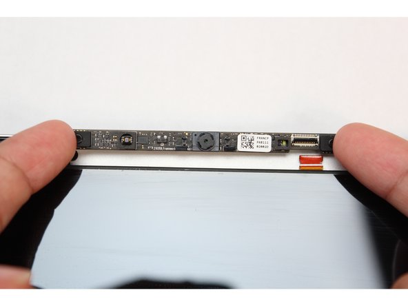 The Webcam Module is now fully disconnected from the Top Cover.