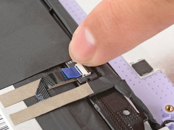 Use your finger to flip down and gently press the locking tab in place.