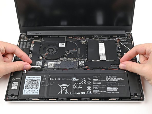 Make sure all of the cables are above the Mainboard before continuing. Refer to this image for where the cables are located.
